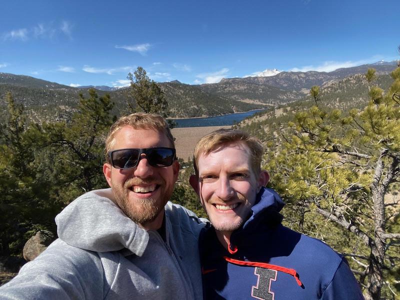 My brother Steve and I standing above a trail in Colorado
