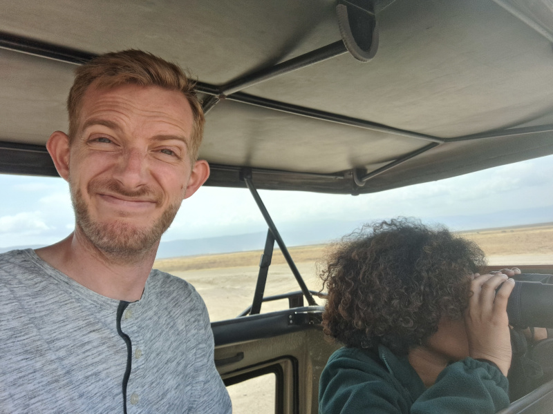 I'm making a goofy face for a selfie while Sarah takes a photo of nature.