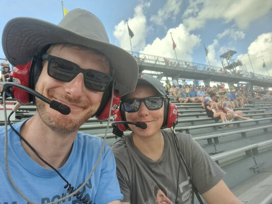 A selfie of me and Emily in our thrift-store racing gear.