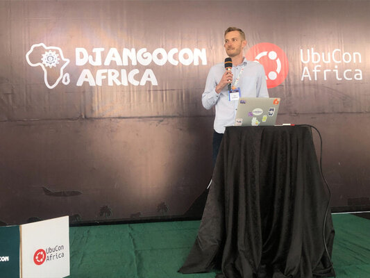A photo of me speaking at DjangoCon Africa.