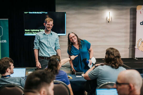 A photo of me and Rachell after speaking laughing as Natalia asks us a question. Photo by Bartek Pawlik - bartpawlik.format.com