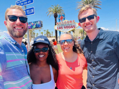 A photo of Steve, Dorine, Emily and me in front of the iconic Las Vegas sign.